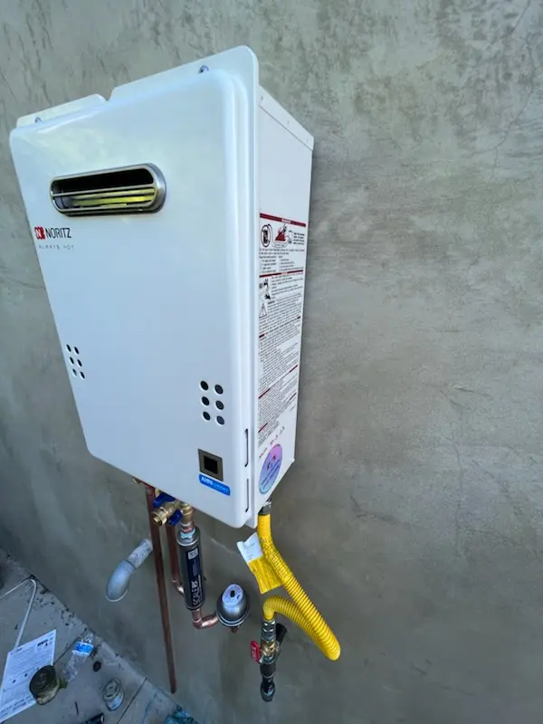 Tankless water heater installation for John J Delaney Homes homes
